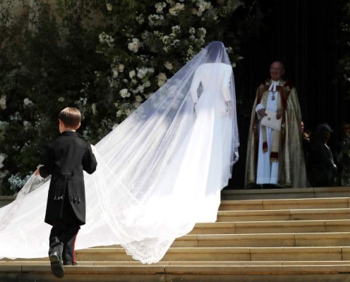 US actress Meghan Markle arrives for the wedding ceremony to marry Britain's Prince Harry, Duke of Sussex, at St George's Chapel, Windsor Castle, in Windsor, on May 19, 2018. / AFP PHOTO / POOL / Brian Lawless