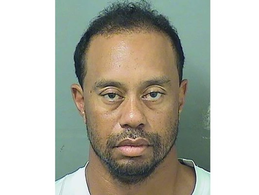 This booking photo obtained May 29, 2017 courtesy of the Palm Beach County Sheriff's Office show Tiger Woods.Golf superstar Tiger Woods was arrested May 29, 2017 in Florida on suspicion of driving under the influence of alcohol or drugs, according to records from the Palm Beach County Sheriff's Office. The 14-time major champion was booked into the Palm Beach County jail on Monday at 7:18 am (1118 GMT) after he was arrested by police in Jupiter, Florida.He was released on his own recognizance at 10:50 am. / AFP PHOTO / Palm Beach County Sheriff's Office / Handout / RESTRICTED TO EDITORIAL USE - MANDATORY CREDIT 'AFP PHOTO / PALM BEACH COUNTY SHERIFF'S OFFICE/HANDOUT' - NO MARKETING NO ADVERTISING CAMPAIGNS - DISTRIBUTED AS A SERVICE TO CLIENTS This booking photo obtained May 29, 2017 courtesy of the Palm Beach County Sheriff's Office show Tiger Woods.Golf superstar Tiger Woods was arrested May 29, 2017 in Florida on suspicion of driving under the influence of alcohol or drugs, according to records from the Palm Beach County Sheriff's Office. The 14-time major champion was booked into the Palm Beach County jail on Monday at 7:18 am (1118 GMT) after he was arrested by police in Jupiter, Florida.He was released on his own recognizance at 10:50 am. / AFP PHOTO / Palm Beach County Sheriff's Office / Handout / RESTRICTED TO EDITORIAL USE - MANDATORY CREDIT 'AFP PHOTO / PALM BEACH COUNTY SHERIFF'S OFFICE/HANDOUT' - NO MARKETING NO ADVERTISING CAMPAIGNS - DISTRIBUTED AS A SERVICE TO CLIENTS