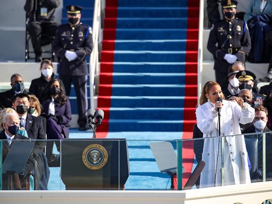 WASHINGTON, DC - JANUARY 20: Jennifer Lopez sings during the inauguration of U.S. President-elect Joe Biden on the West Front of the U.S. Capitol on January 20, 2021 in Washington, DC. During today's inauguration ceremony Joe Biden becomes the 46th president of the United States. Rob Carr/Getty Images/AFP== FOR NEWSPAPERS, INTERNET, TELCOS & TELEVISION USE ONLY ==
