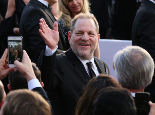 (FILES) In this file photo taken on February 28, 2016 Harvey Weinstein arrives on the red carpet for the 88th Oscars in Hollywood, California. - Disgraced Hollywood mogul Harvey Weinstein on was convicted February 24, 2020 of sexual assault and rape but cleared of the most serious predatory sexual assault charges. The jury of seven men and five women found the producer guilty of criminal sexual acts in the first degree and rape in the third degree, a partial victory for the #MeToo movement that considered the case a watershed moment.The 67-year-old was found not guilty however of first-degree rape and predatory sexual assault charges that could have seen him jailed for life. (Photo by JEAN BAPTISTE LACROIX / AFP)