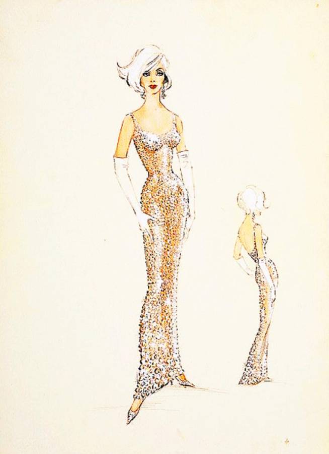 El vestido fue diseñado por Jean Louis, inspirado en un boceto de Bob Mackie. El vestido fue diseñado por Jean Louis, inspirado en un boceto de Bob Mackie.