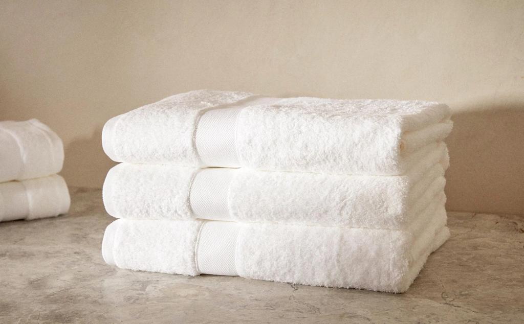 Toallas de algodón premium, extra absorbente y resistente al lavado.
