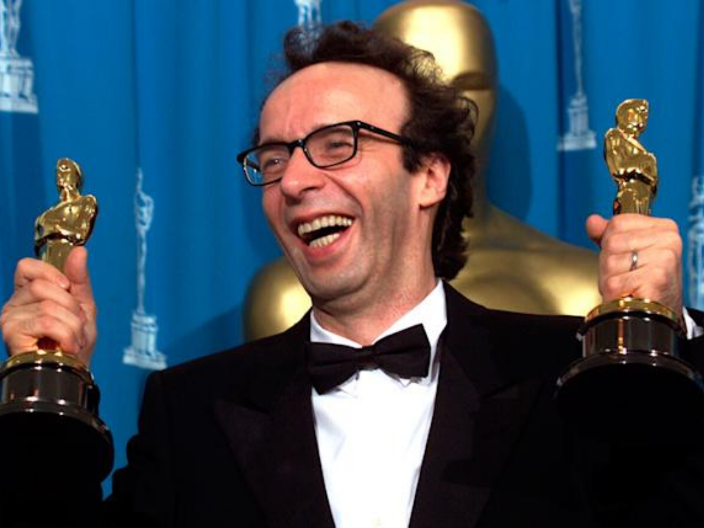 Roberto Benigni.Roberto Benigni ganó dos premios en 1999, como Mejor Actor y por Mejor Película Extranjera con ‘’La vida es bella’’. Sin embargo, aunque esta película se considera muy conmovedora, los rumores mencionan que su triunfo fue montado, pues el actor tenía buena amistad con muchos de los productores encargados de la gala.