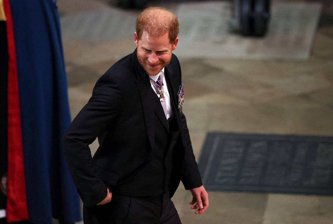 El príncipe Harry en una imagen reciente, durante la coronación de su padre, Carlos III, en la abadía de Westminster (Photo by PHIL NOBLE / POOL / AFP)