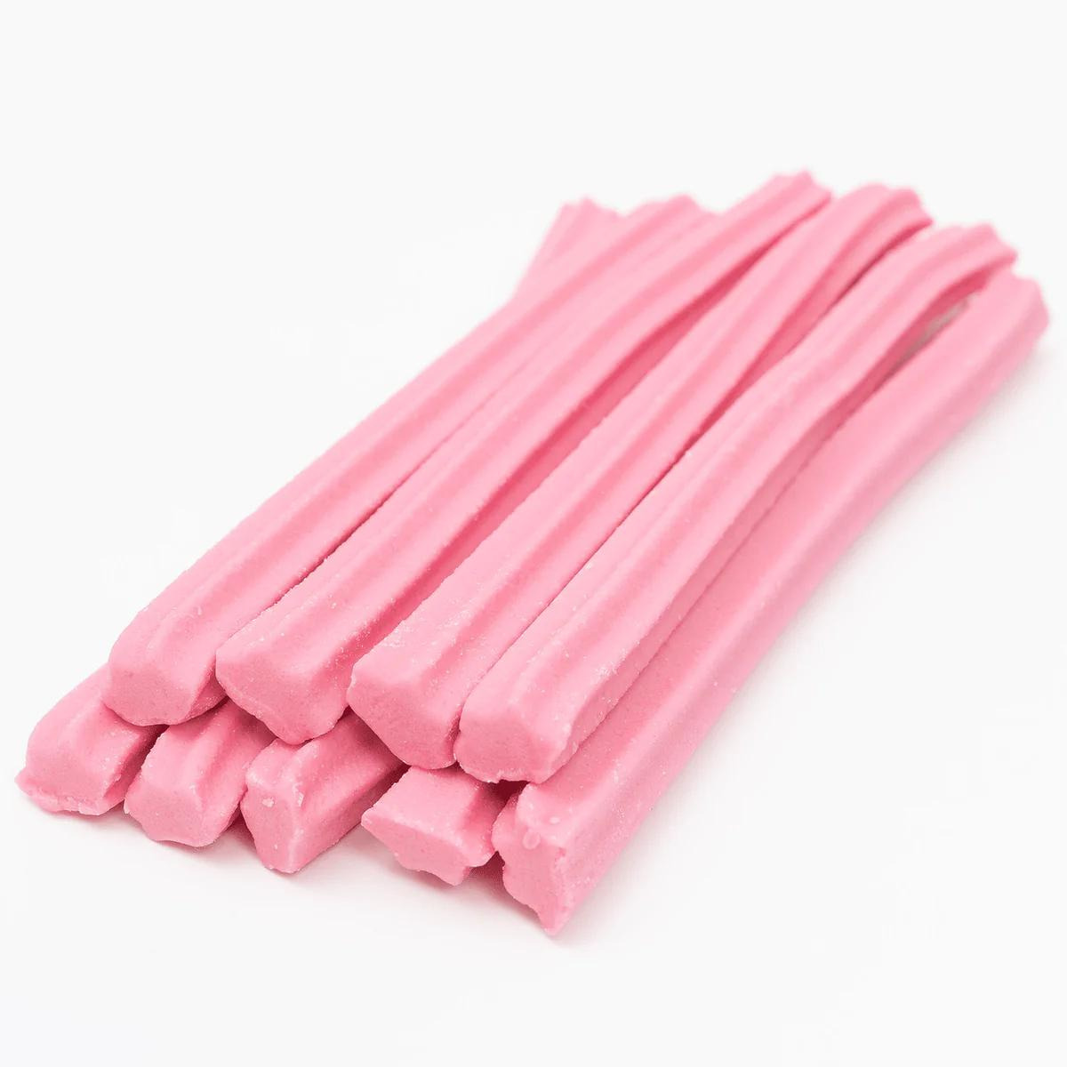 El musk stick es un dulce australiano que se vende como un palo largo rosado que es muy suave y tiene un sabor dulce y floral. 