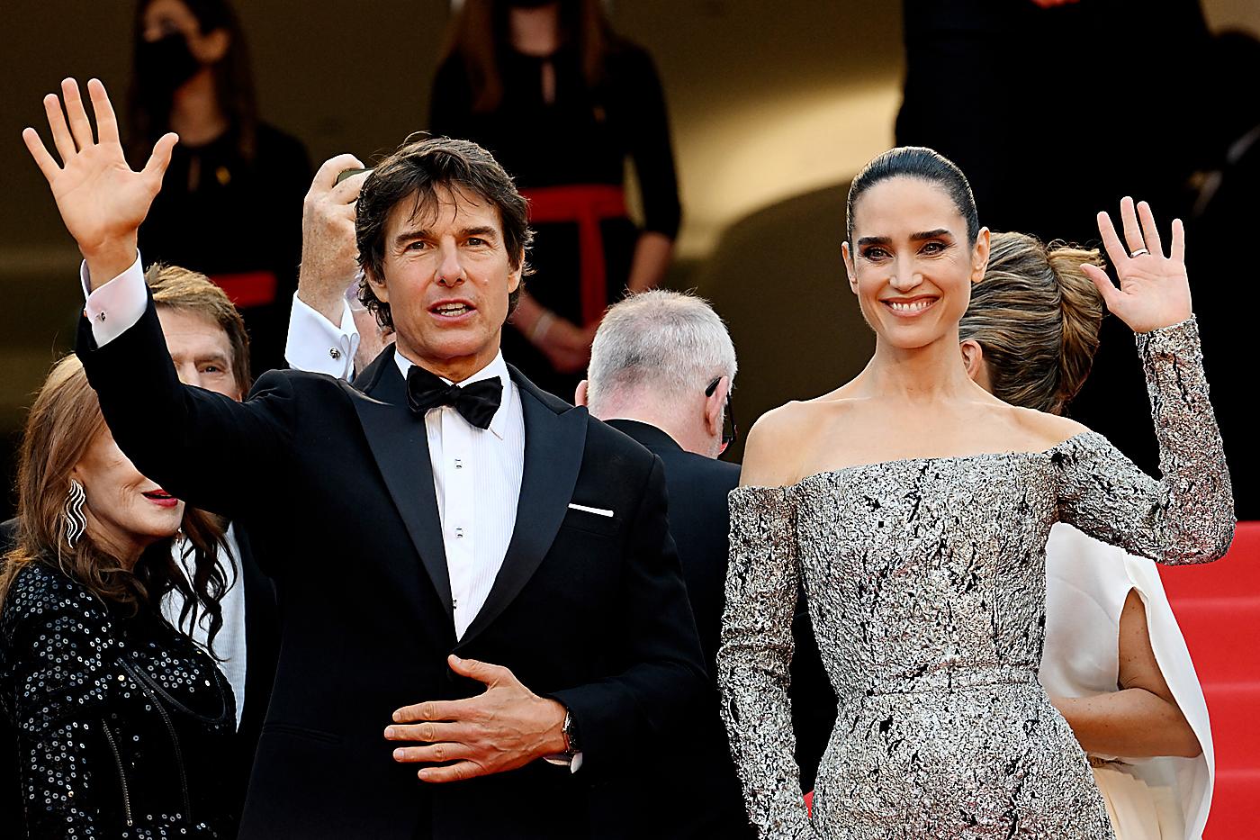 La 75 edición de Cannes revivió el glam en la riviera francesa, donde el star system celebró la entrega de la Palma de Oro honorífica aTom Cruise, quien ha causado revuelo con Top Gun: Maverick.En esta foto: Tom Cruise y Jennifer Connelly a su llegada a la proyección de la película Top Gun : Maverick, presentada en la apertura de la 75 edición del Festival de Cannes
