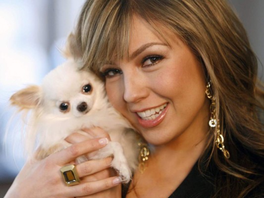 Thalia y su mascota Rata.