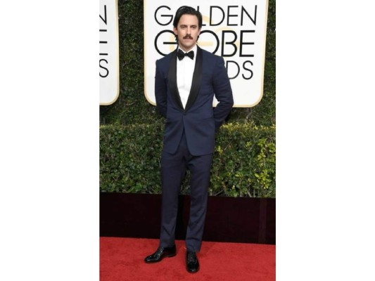Milo Ventimiglia es un elegante traje de Ralph Lauren