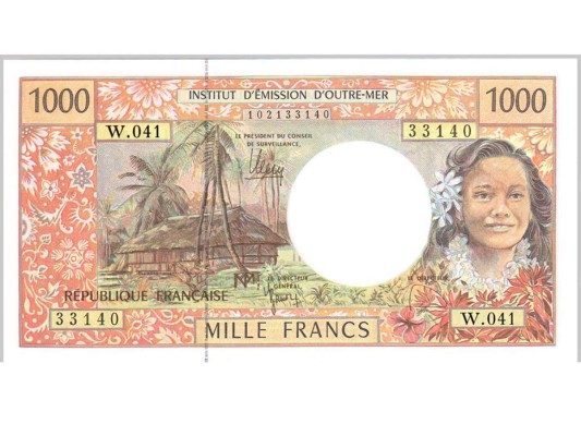 Un colorido billete de 1,000 de la Polinesia francesa, donde la moneda es el franco CFP.