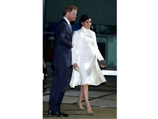 Britain's Prince Harry, Duke of Sussex and Meghan, Duchess of Sussex arrive to attend The Mountbatten Festival of Music at the Royal Albert Hall in London on March 7, 2020. - The Festival brings together world-class musicians, composers and conductors of the Massed Bands of Her Majestys Royal Marines. This year, the performance will mark the 75th anniversary of the end of the Second World War and the 80th anniversary of the formation of Britains Commandos. (Photo by SIMON DAWSON / POOL / AFP)