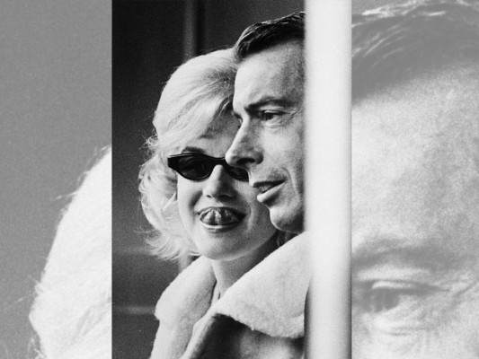 Marilyn Monroe con su esposo Joe DiMaggio durante un juego de los Yankees el 11 de abril de 1961.