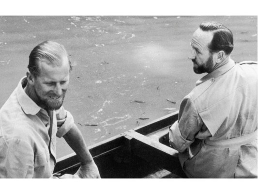 En noviembre de 1956, Felipe se embarcó en un tour en solitario por cuatro meses por el Pacífico. Durante este, se rumora que el consorte tuvo aventuras con muchas mujeres. Adicionalmente, su secretario privado, Michael Parker, tuvo que renunciar debido a que su esposa estaba pidiendo el divorcio por adulterio. La Reina le tuvo que dar el título de Príncipe para que él no declarara en el juicio de divorcio.