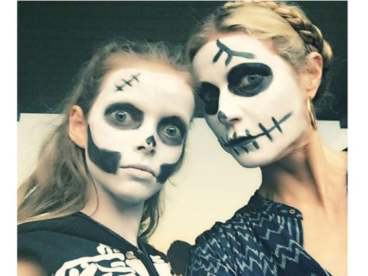 Gwyneth Paltrow y su hija Apple con sus rostros pintados como calaveras