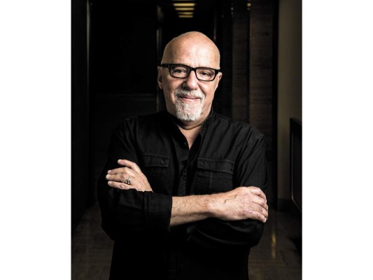 Brasilian writer Paulo Coelho photographed in the building where he lives in Geneva, Switzerland. CREDIT: Niels Ackermann / Rezo.ch for The Wall Street Journal