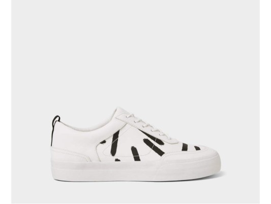 white sneaker with painted look design