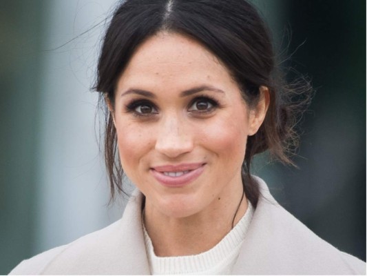 FILE - In this file photo dated Monday, April 23, 2018, Britain's Prince Harry and his fiancee Meghan Markle attend a Memorial Service to commemorate the 25th anniversary of the murder of black teenager Stephen Lawrence at St Martin-in-the-Fields church in London. Now with only a week until the May 19 wedding of Prince Harry and Meghan Markle, a party atmosphere is developing in the English city of Windsor, with tens of thousands of visitors expected in the city on the couple’s wedding day. (AP Photo/Matt Dunham, FILE)