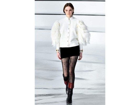A model presents a creation for Chanel during the Women's Fall-Winter 2020-2021 Ready-to-Wear collection fashion show in Paris, on March 3, 2020. (Photo by Christophe ARCHAMBAULT / AFP)