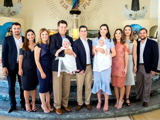 Fabián y Mateo Rodríguez reciben el sacramento del bautismo  