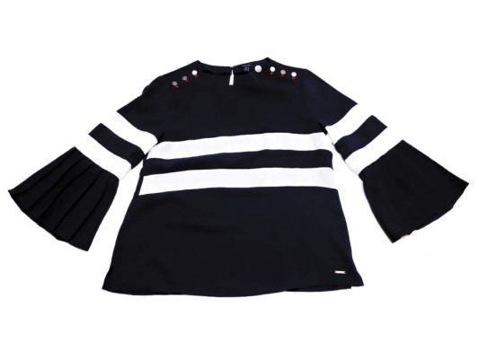 Una blusa ligera para una vibra casual en tus outfits para tus vacaciones