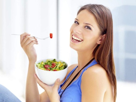 A Generic Photo of a woman enjoying a salad. See PA Feature WELLBEING Super Salads. Picture credit should read: PA Photo/thinkstockphotos. WARNING: This picture must only be used to accompany PA Feature WELLBEING Super Salads.