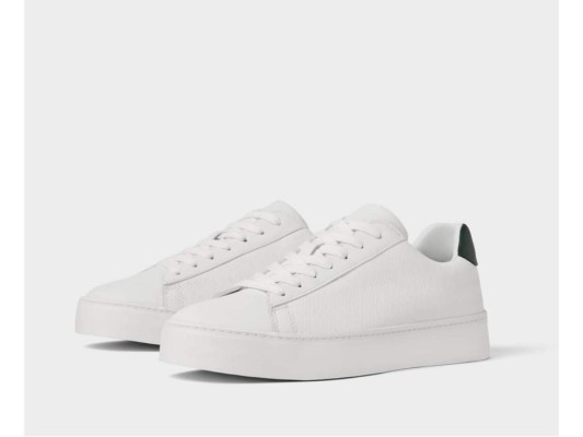 white emboused plimsolls