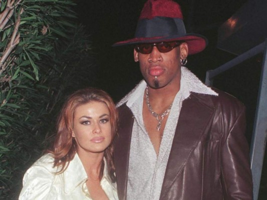 Carmen Electra y Dennis Rodman<br/>Puede que en 1998 la pareja haya estado un poco intoxicada cuando se casó, por lo que se divorciaron nueve días después.