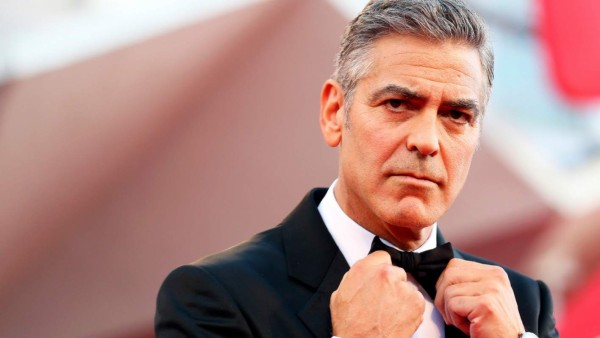 George Clooney demandará a la revista que publicó las fotos de sus hijos.