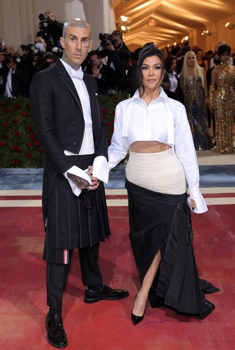 Travis Baker y Kourtney Kardashian.