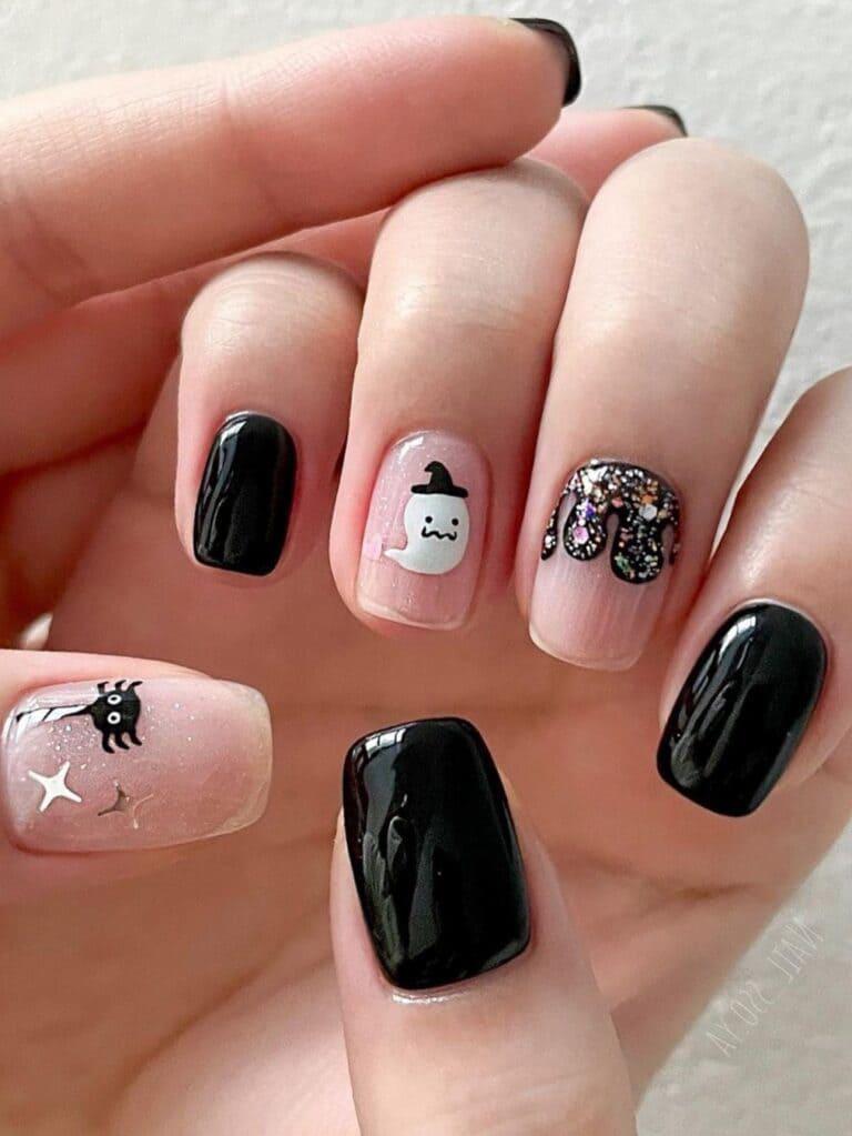 Captura la esencia caprichosa de Halloween con estos adorables diseños de uñas con fantasmas juguetones