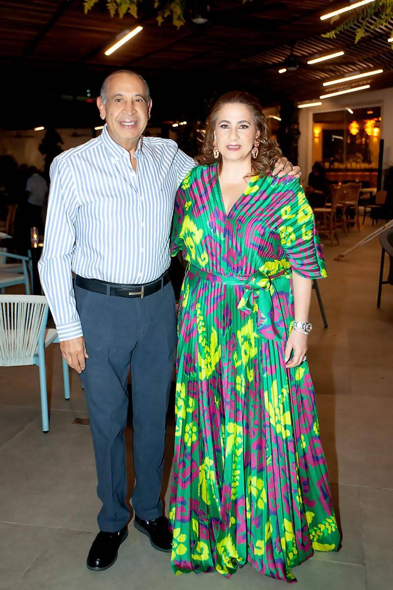 Leonel Giannini y la anfitriona Fanny Hawit.