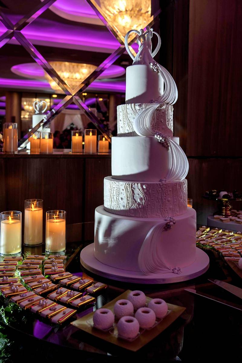 El pastel de bodas fue elaborado por los expertos de Signature Cake. 