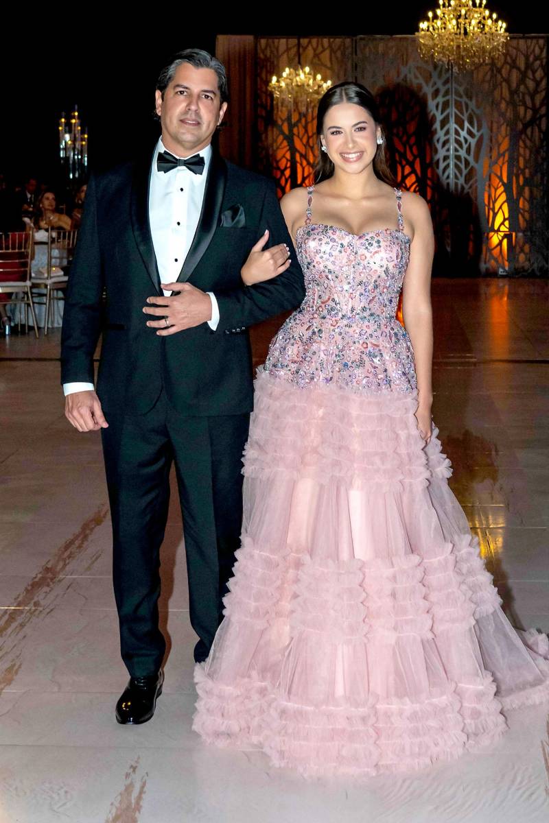 Natalie Romero y su padre Edgardo Romero.
