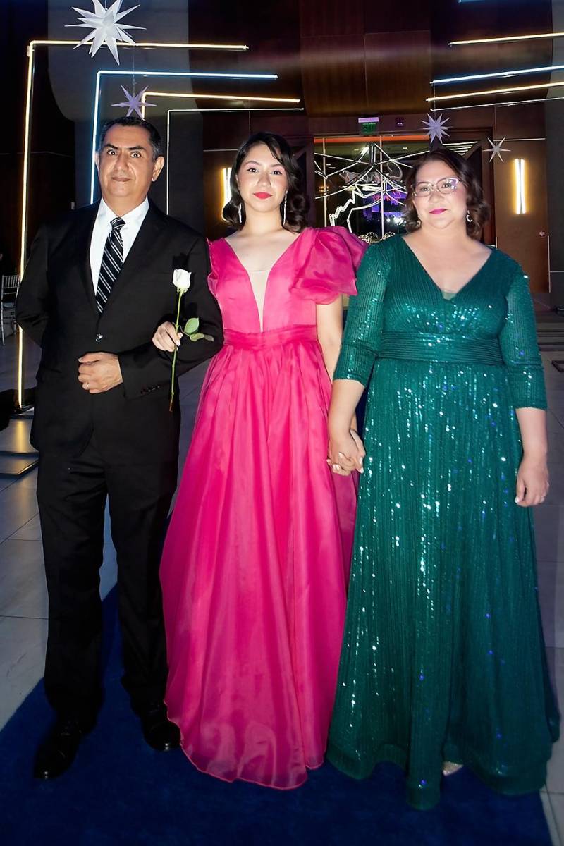 Francisco y Guityen Rodríguez con su hija Guityen 