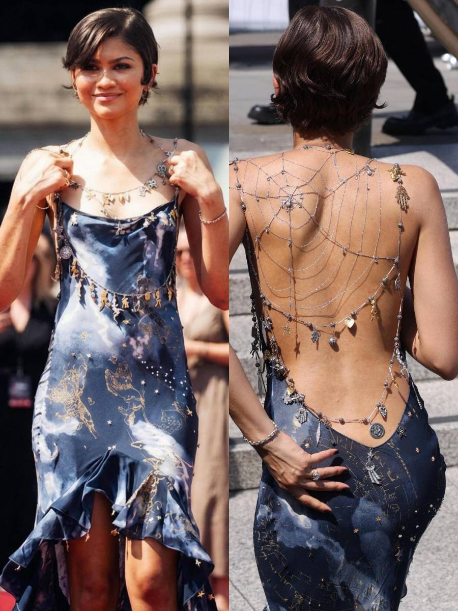 Para una photo call en Londres, la Hollywood star cautivó a las cámaras con un etéreo vestido azul medianoche de la colección Primavera 1997 de John Galliano. La pieza cubierta de charms constaba de una espalda baja y abierta, embellecida con una fascinante telaraña hecha de cadenas.
