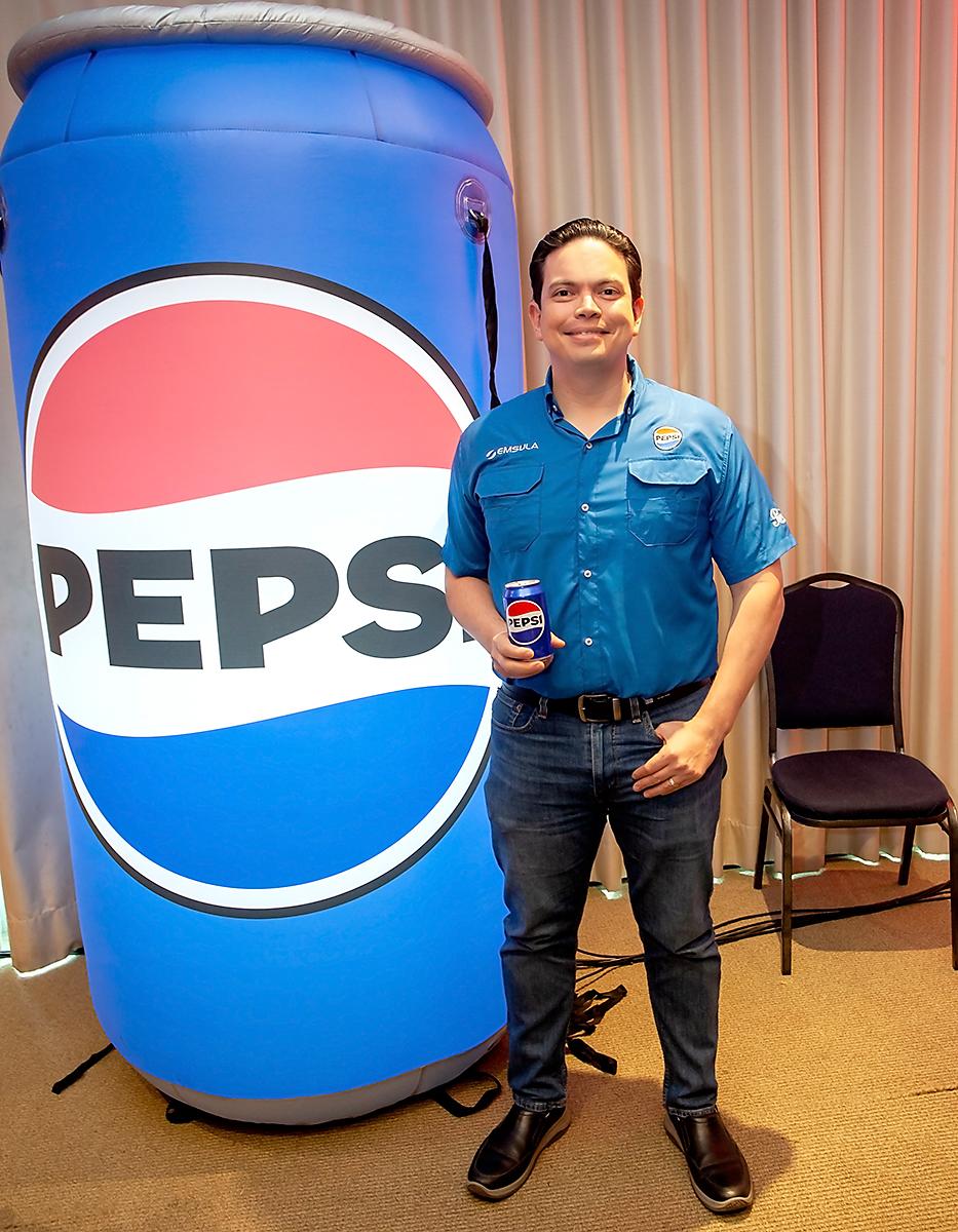 César Iván Aguilar, de Embotelladora de Sula.