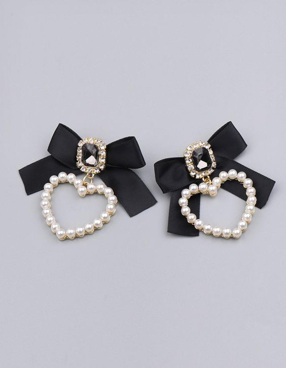 Divertidos aretes en forma de corazón