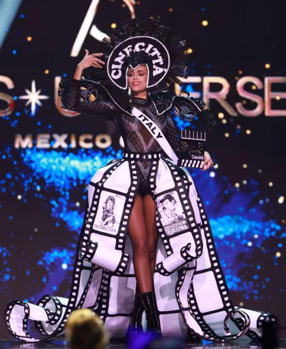 Miss Italia, Glenany Cavalcante, deslumbró al rendir homenaje al cine italiano de los años sesenta, una época dorada que marcó la historia del séptimo arte. Su traje evocó la elegancia y el glamour de ese periodo, inspirado en íconos de las películas clásicas que definieron el estilo y la cultura de Italia en el mundo.